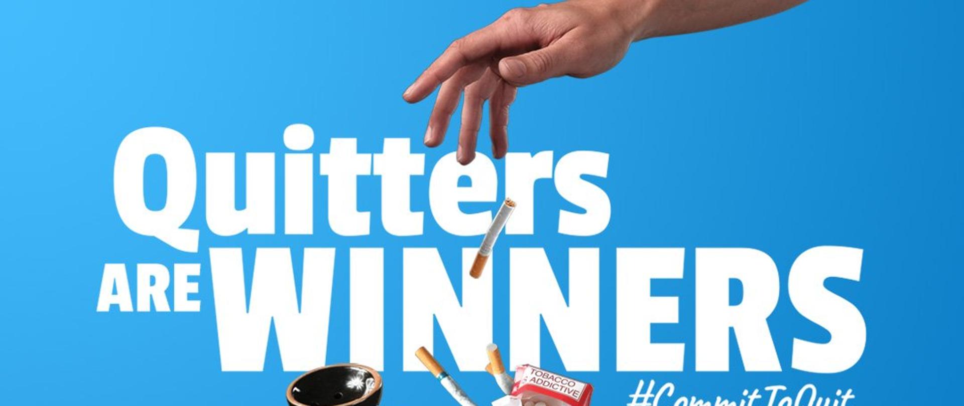 Baner World Health Organization - przedstawia kosz na śmieci wypełniony papierosami i akcesoriami dp palenia, hasło Quitters are Winners 