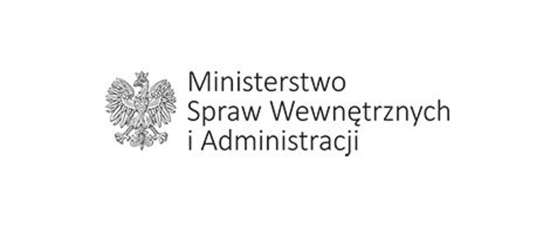Napis Ministerstwo Spraw Wewnętrznych i Administracji, po lewej stronie Wizerunek Orła białego w koronie na białym tle
