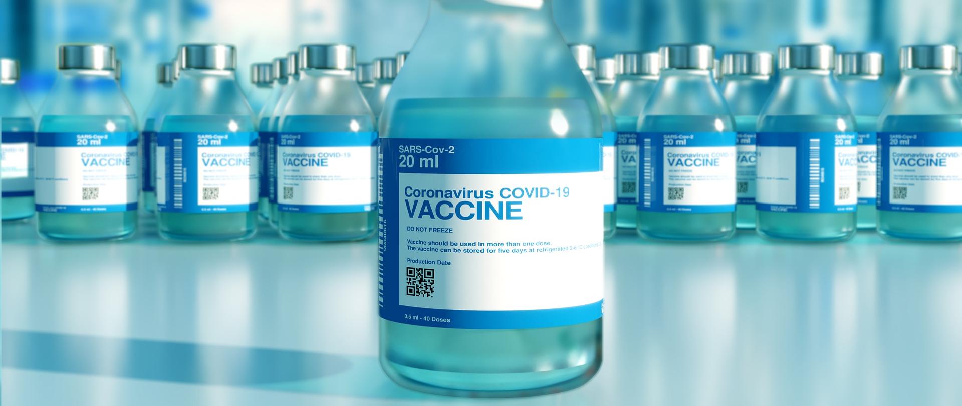 fiolki z napisem szczepionka.