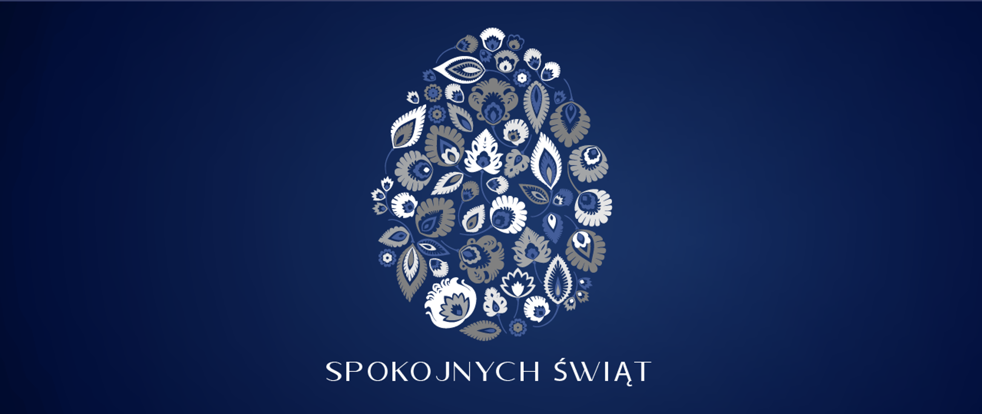 Na granatowym tle biały napis: Spokojny Świąt. Na napisem wory łowickie ułożone w kształt pisanki