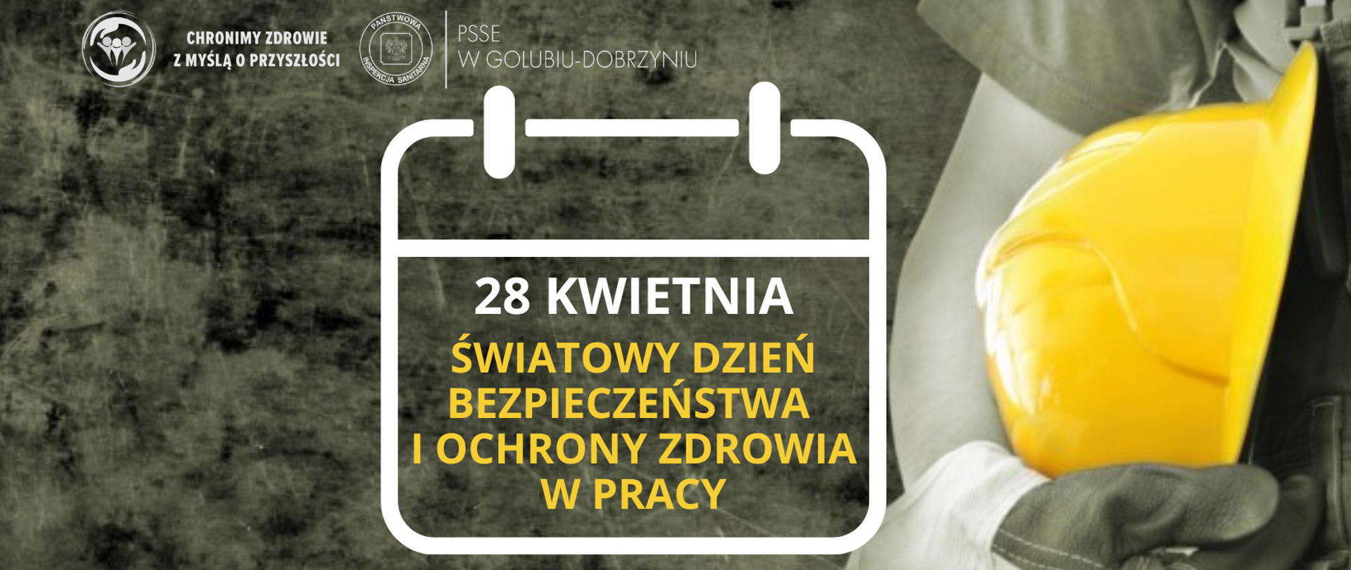 Po lewej stronie napis: "28 kwietnia- Światowy Dzień Bezpieczeństwa i Ochrony Zdrowia w Pracy", a powyżej wspólny logotyp Państwowej Inspekcji Sanitarnej oraz PSSE w Golubiu-Dobrzyniu. Po prawej stronie wizerunek pracownika fizycznego w roboczych rękawicach trzymającego żółty kask ochronny.