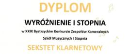 Dyplom na białym tle z wizerunkiem szkoły w Bystrzycy Kłodzkiej informujący o otrzymaniu wyróżnieniu na XXIX Bystrzyckim Konkursie Zespołów Kameralnych
