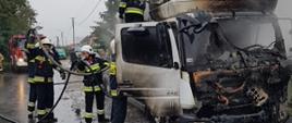 Całkowicie spalona biała kabina samochodu ciężarowego, grupa strażaków zalewa ją wodą.