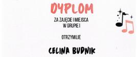 Zdjęcie przedstawia dyplom za zajęcie I miejsca dla uczennicy Celiny Bludnik. Na białym tle podpisy jurorów oraz graficzne rysunki nut i gwiazdek w różnych kolorach.