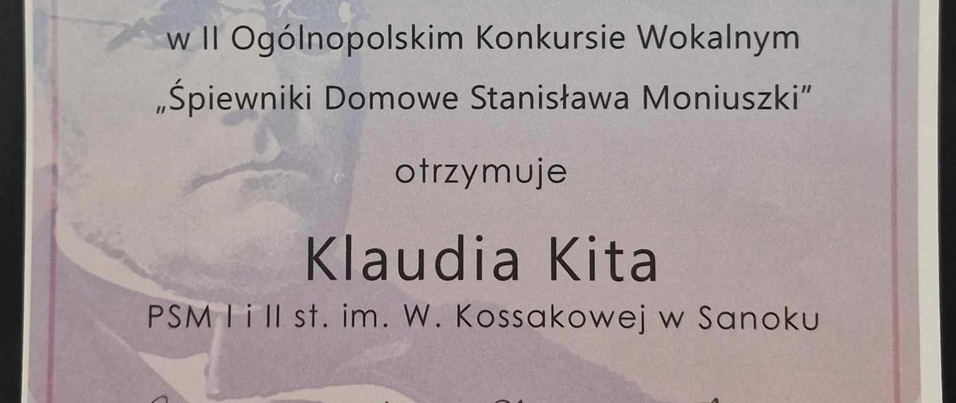 Dyplom - Klaudia Kita - Ogólnopolski Konkurs Wokalny. Szare tło, Stanisław Moniuszko, czarne litery