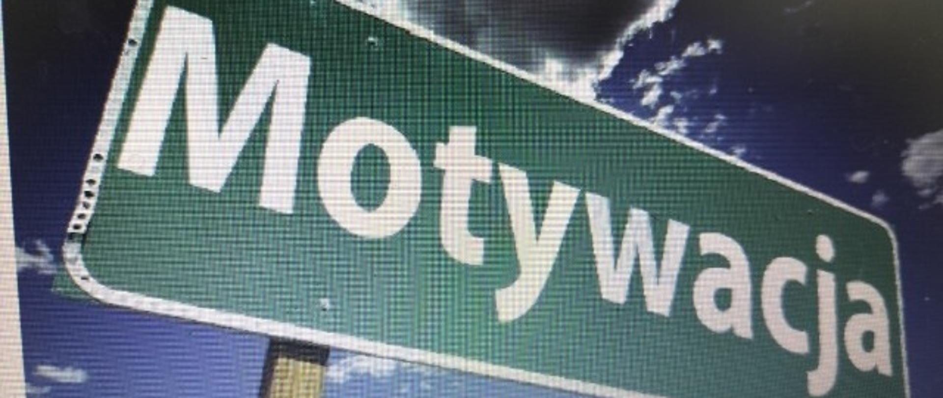 biały napis - motywacja - na zielonej tablicy