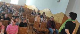 uczniowie i nauczyciele podczas wykładu