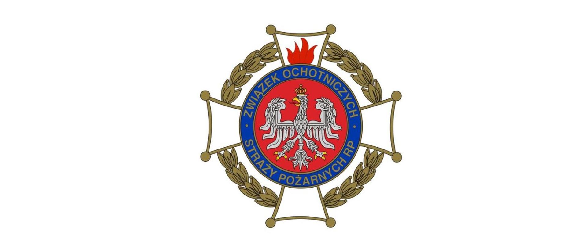 Na obrazku w środkowej części widać białego orła wpisanego w czerwone koło. Koło otoczone jest przez niebieski okrąg z napisem "Związek Ochotniczych Straży Pożarnych RP". Całość nakłada się na krzyż maltańskim opleciony złotymi laurami. U góry widać płomień.