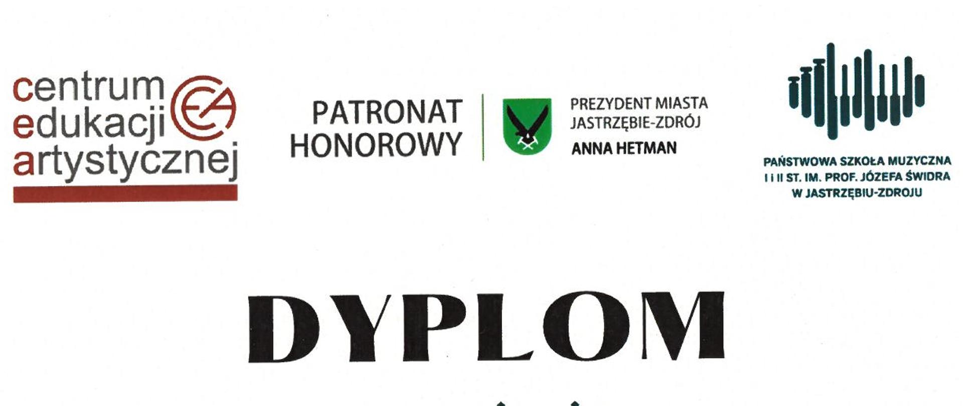 Z prawej strony dyplomu widniej fragment czaszy instrumentu dętego, na tle nut.
Od góry strony umieszczone są następujące napisy:
Logo Centrum Edukacji Artystycznej
Patronat Honorowy: Logo Prezydent Miasta Jastrzębie Zdrój Anna Hetman
Logo Państwowej Szkoły Muzycznej I i II st. im. Prof. Józefa Świdra w Jastrzębiu-Zdroju
Dyplom za zajęcie II miejsca otrzymuje Jan Borejko XIII Międzynarodowy Konkurs „Instrumenty dęte” – kategoria instrumentów dętych drewnianych, grupa II.
Na dole strony umieszczone są podpisy Jury.
