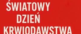 Biały napis "Światowy dzień Krwiodawstwa" na czerwonym tle