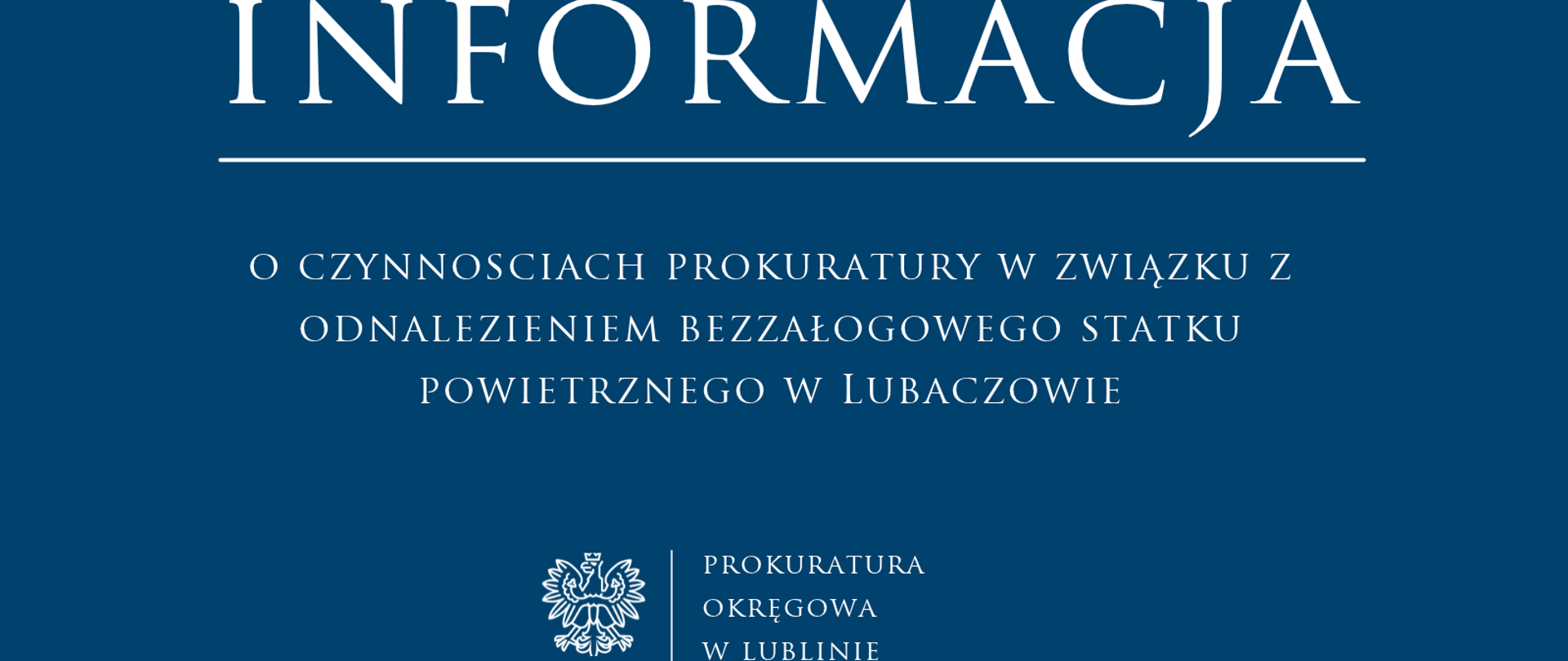 Niebieski baner o treści: Informacja o czynnościach prokuratury w związku z odnalezieniem bezzałogowego statku powietrznego w Lubaczowie