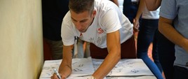 Powitanie polskich lekkoatletów - uczestników ME Berlin 2018 Podpisywanie koszulek 1