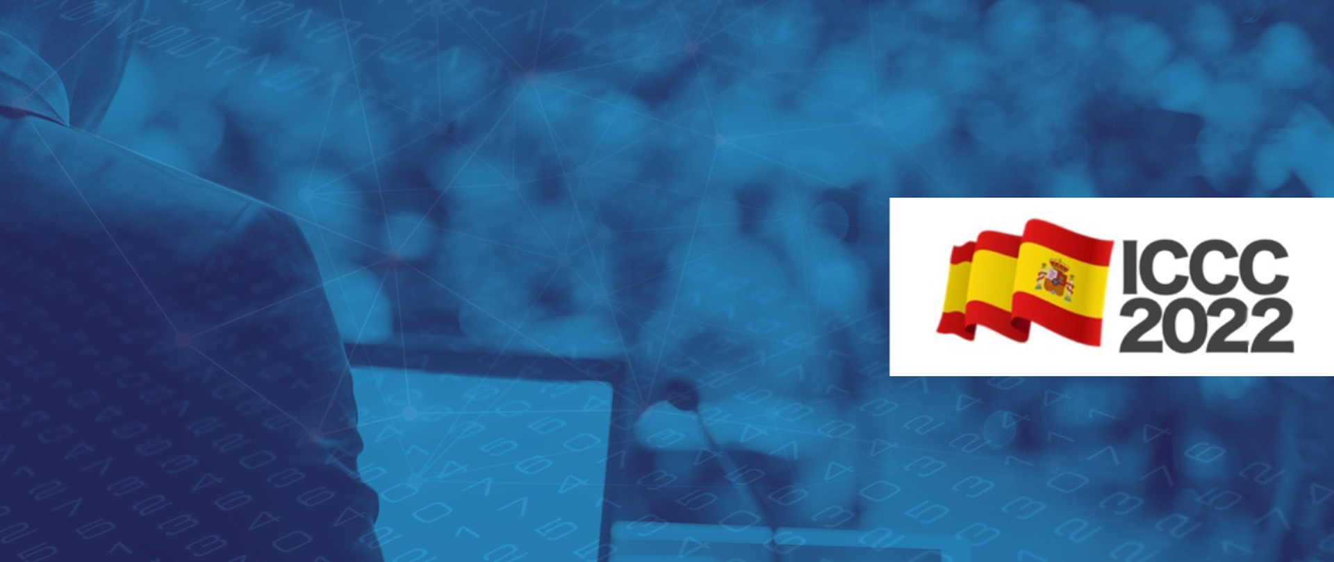 Na ilustracji zdjęcie osoby stojącej przy pulpicie na sali konferencyjnej oraz logo konferencji ICCC 2022.