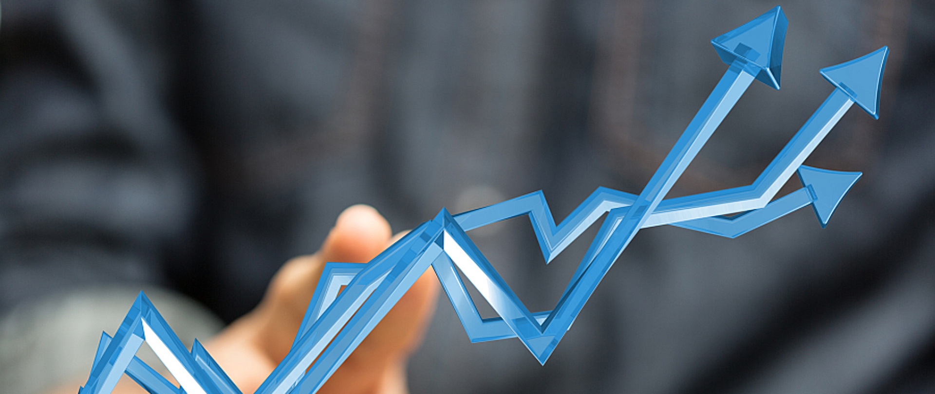 Ręka dotyka wykresu strzałkowego