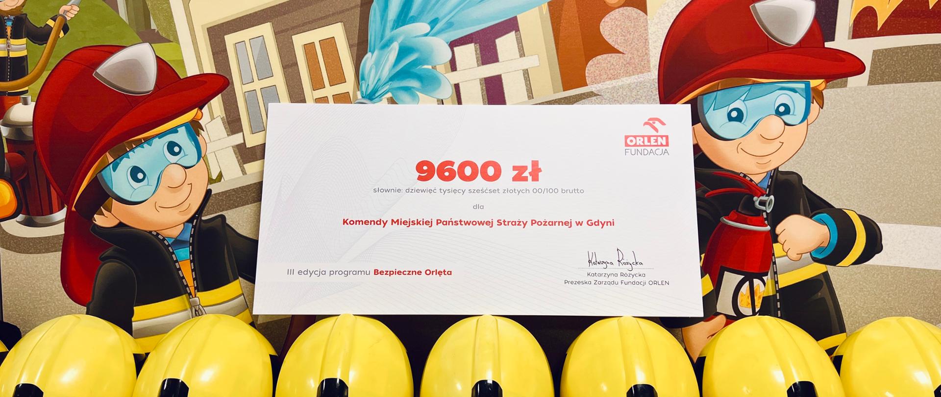Nagroda w postaci czeku na kwotę 9600 zł dla Komendy Miejskiej PSP w Gdyni.
