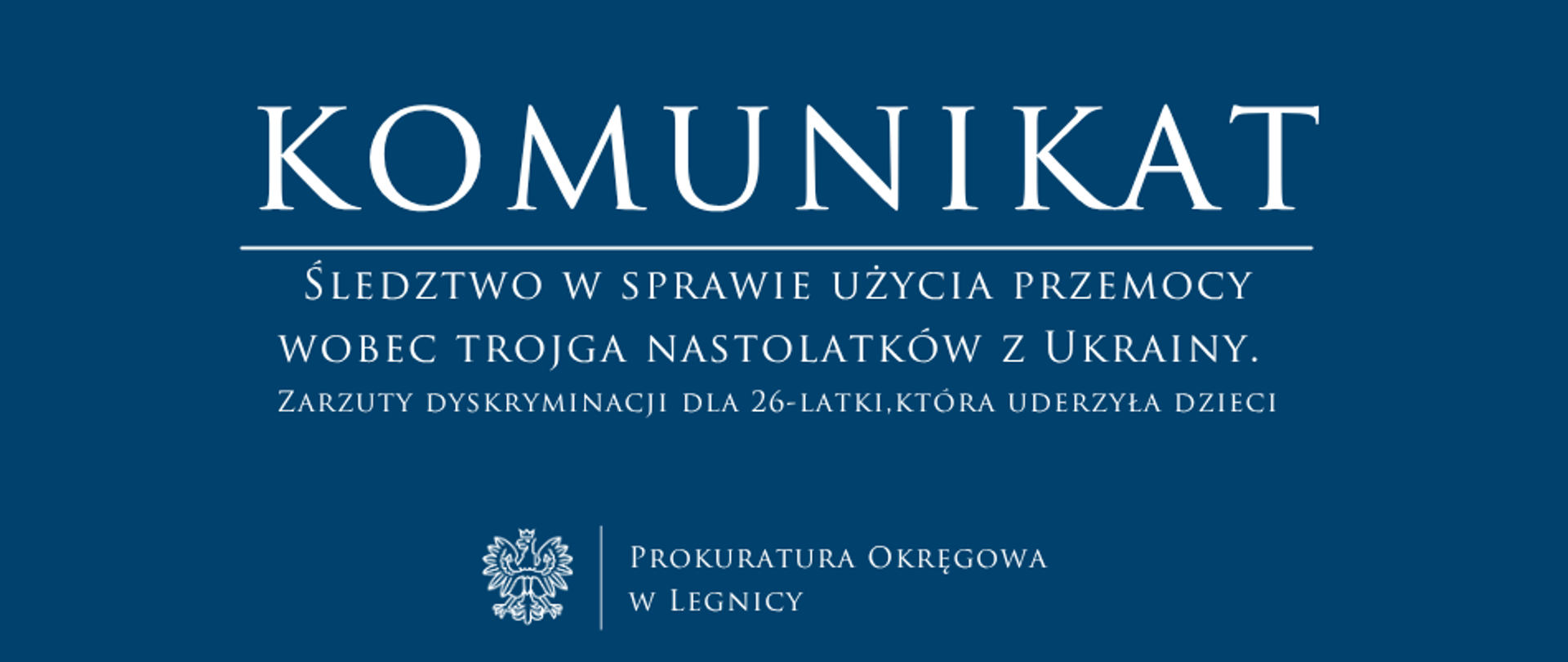 baner - na niebieskim tle napis w kolorze białym Komunikat, poniżej pozioma biała kreska, pod kreską tytuł, niżej pośrodku rysunek orła oddzielony od napisu Prokuratura Okręgowa w Legnicy krótką pionową kreską