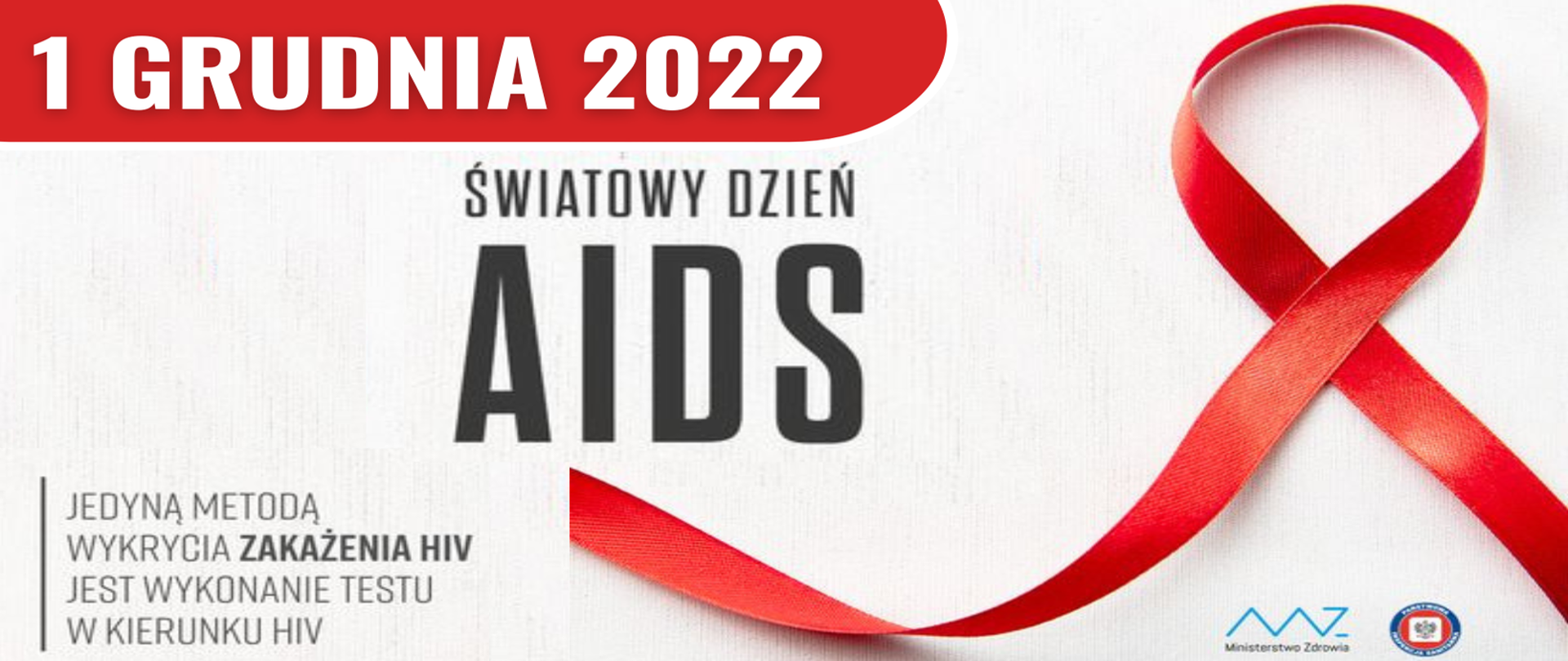 czerwona kokarda w tle oraz zapis: 1 grudnia 2022 - Światowy Dzień AIDS