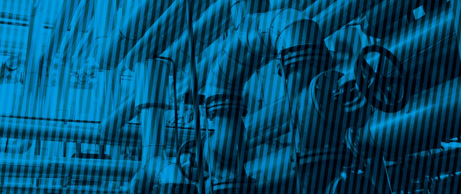 Grafika z rurami i zaworami za warstwą pasów.