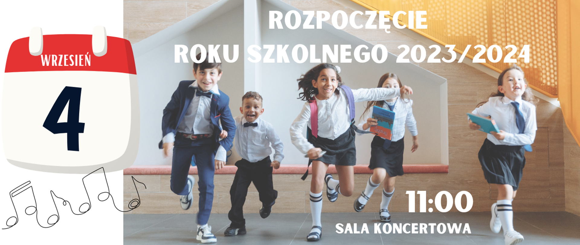 Na tle korytarza szkolnego biegnące na rozpoczęcie roku szkolnego dzieci.
