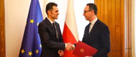 Minister infrastruktury Dariusz Klimczak oraz powołany na stanowisko wiceministra infrastruktury Piotr Malepszak