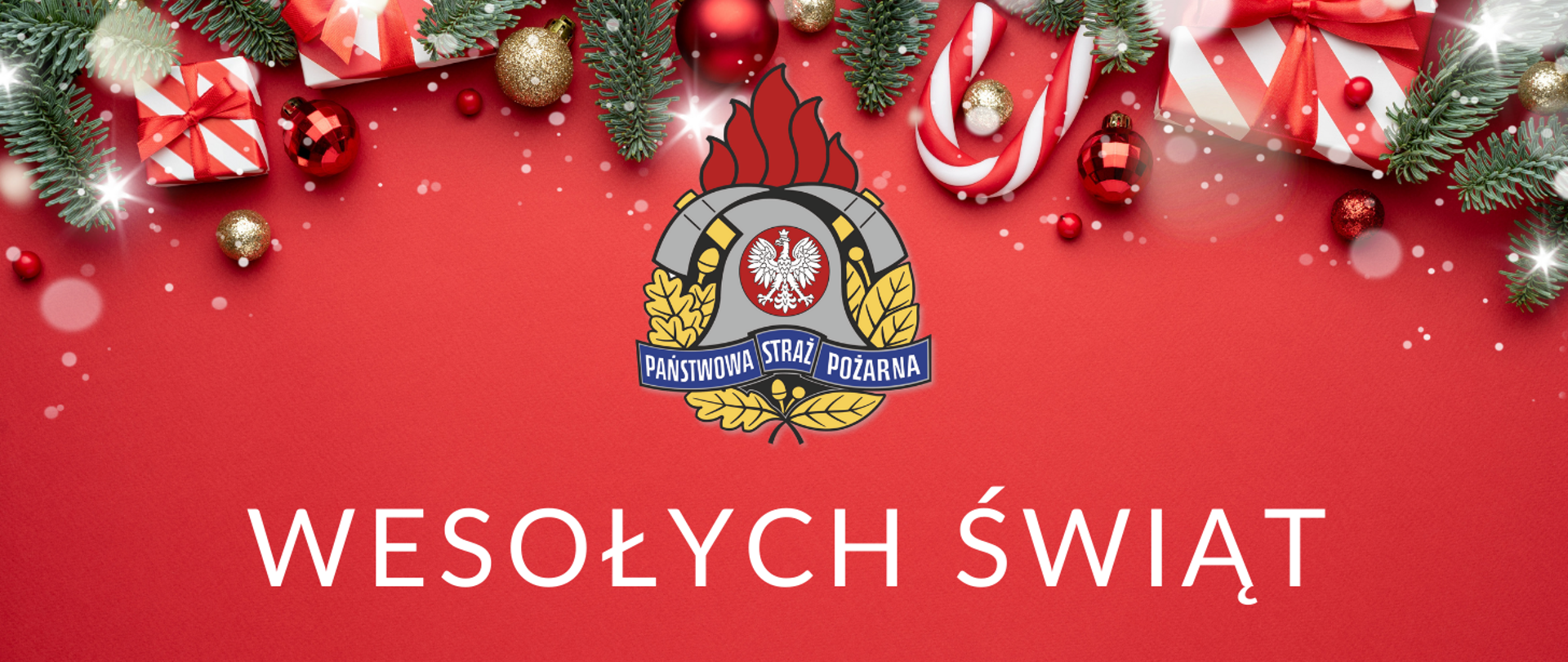 Czerwone tło, u góry centralnie białoczerwone prezenty, gałązki świerkowe, złote i czerwone bombki. Centralnie na środku kolorowe logo PSP. Poniżej biały napis: "Wesołych Świąt".