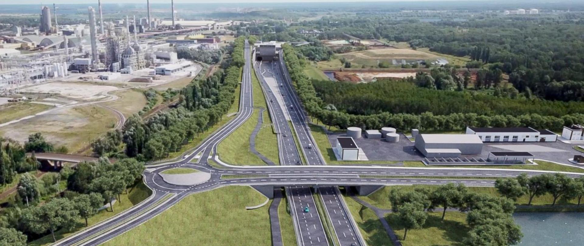 Zdjęcie przedstawia widok z lotu ptaka na rozległy obszar przemysłowy zintegrowany z nowoczesną infrastrukturą drogową. Centralnym elementem jest wielopasmowa droga z wiaduktem i rondem, otoczona zielenią i drzewami. Po lewej stronie znajduje się kompleks przemysłowy z licznymi budynkami, kominami i zbiornikami magazynowymi. Po prawej stronie dominują tereny zielone oraz budynki związane prawdopodobnie z obsługą infrastruktury drogowej lub przemysłowej. Całość ukazuje harmonijne połączenie transportu i przemysłu w kontekście urbanistycznym.