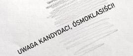 Na białej kartce napis : Uwaga kandydaci, ósmoklasiści
