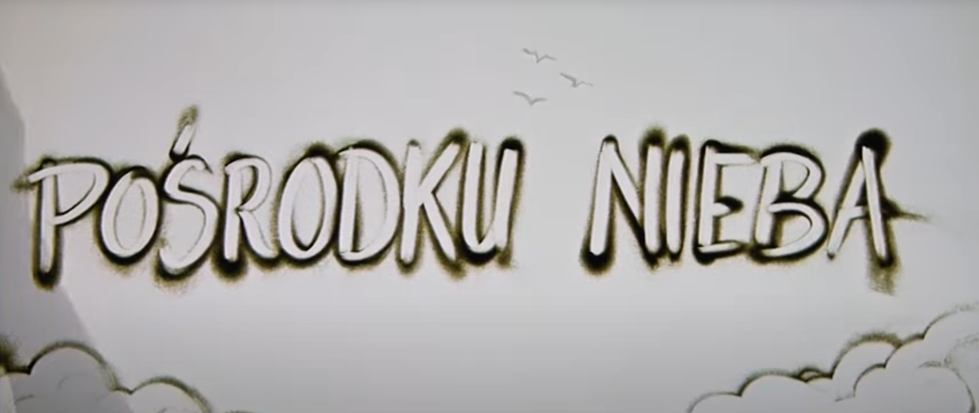 napis zrobiony mąką o treści - pośrodku nieba