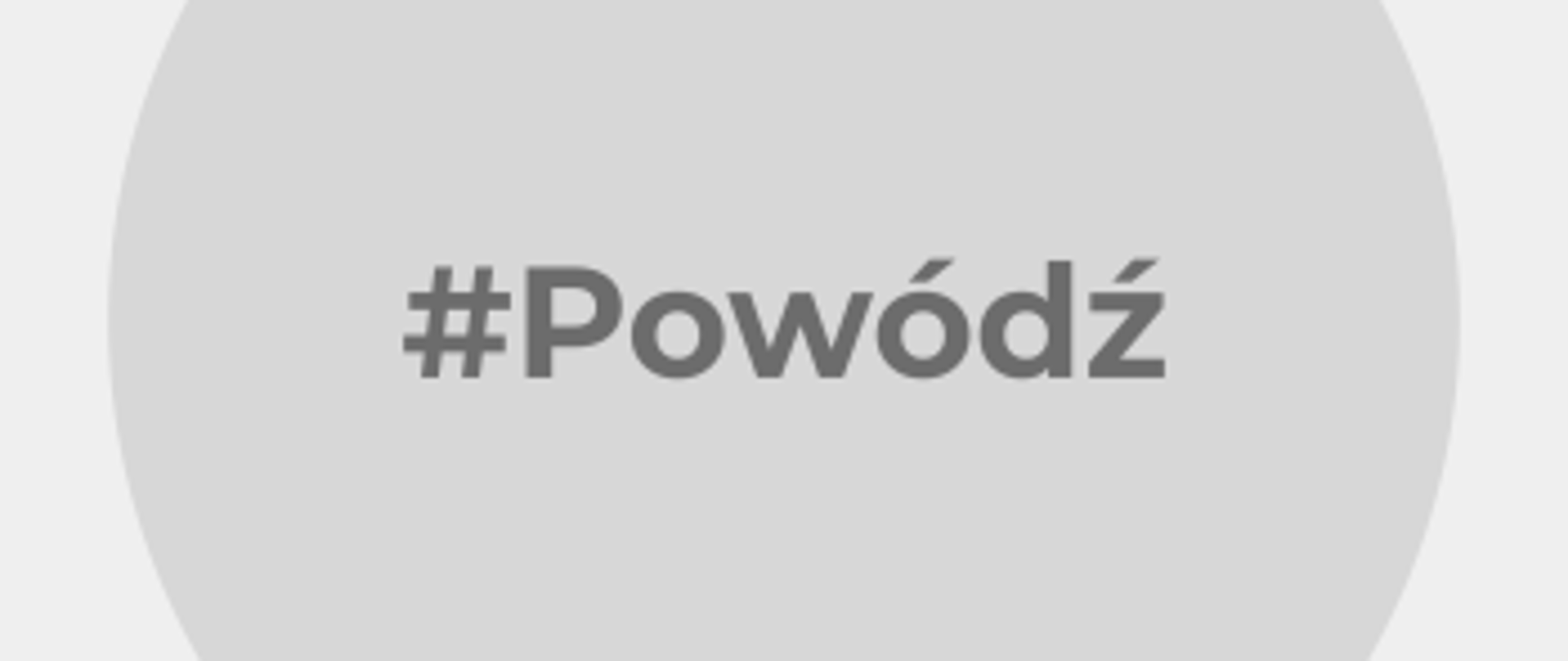 Napis #powódź na szarym tle.