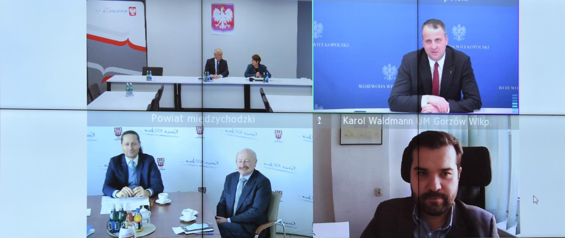 5 ekranów wyświetlanych na wspólnej planszy, widać na nich uczestników wideokonferencji - wojewodę lubuskiego i wielkopolskiego, starostę międzychodzkiego, wiceprezydent Gorzowa oraz pracownika UM Gorzów