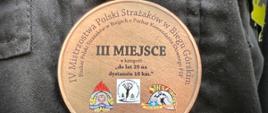 medal w biegu górskim w IV mistrzostwach Polski Strażaków