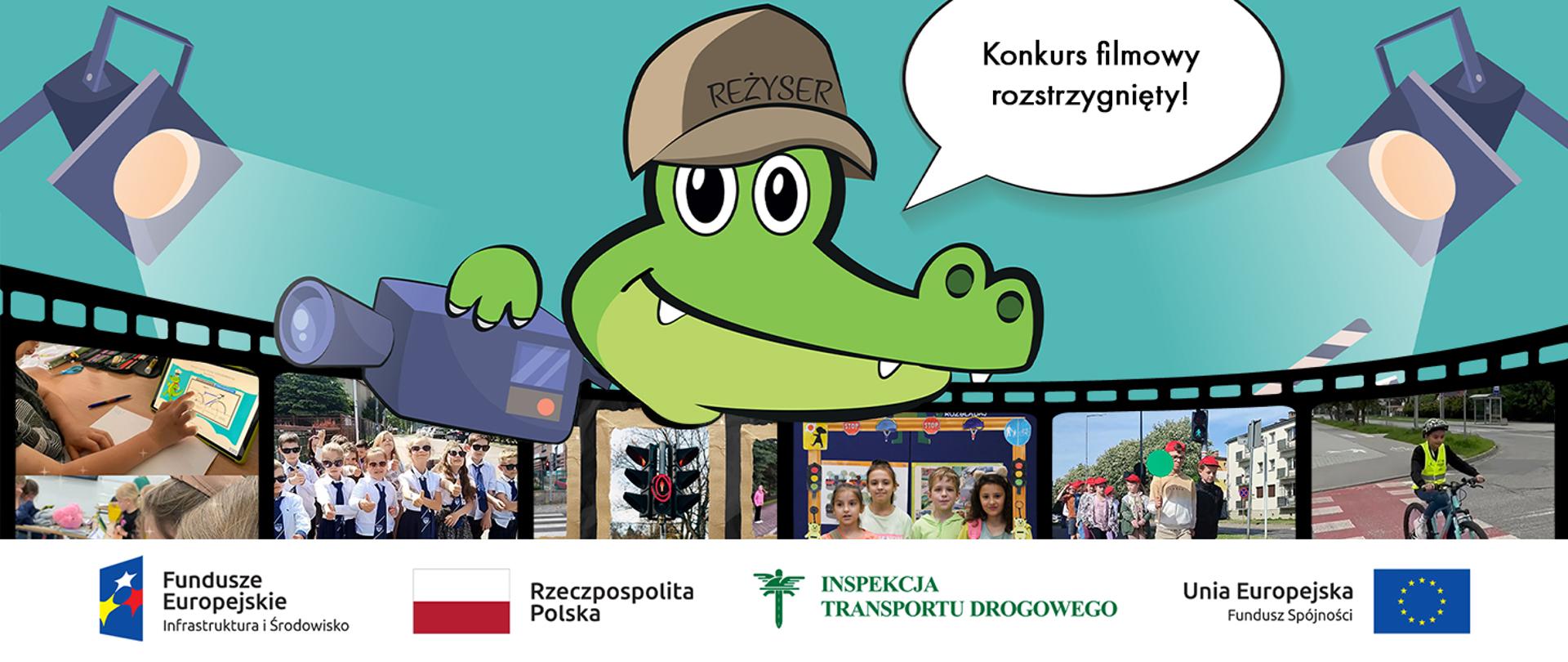 Na planie centralnym sylwetka Krokodylka Tirka w czapce z napisem REŻYSER i kamerą w prawej dłoni. Przez całą szerokość zdjęcia przechodzi klisza filmowa, na której poszczególne slajdy pokazują różne sceny przedstawione przez uczestników konkursu. Na dole zdjęcia logotypy Funduszy Europejskich , Rzeczpospolitej Polskiej, Inspekcji Transportu Drogowego i Unii Europejskiej.