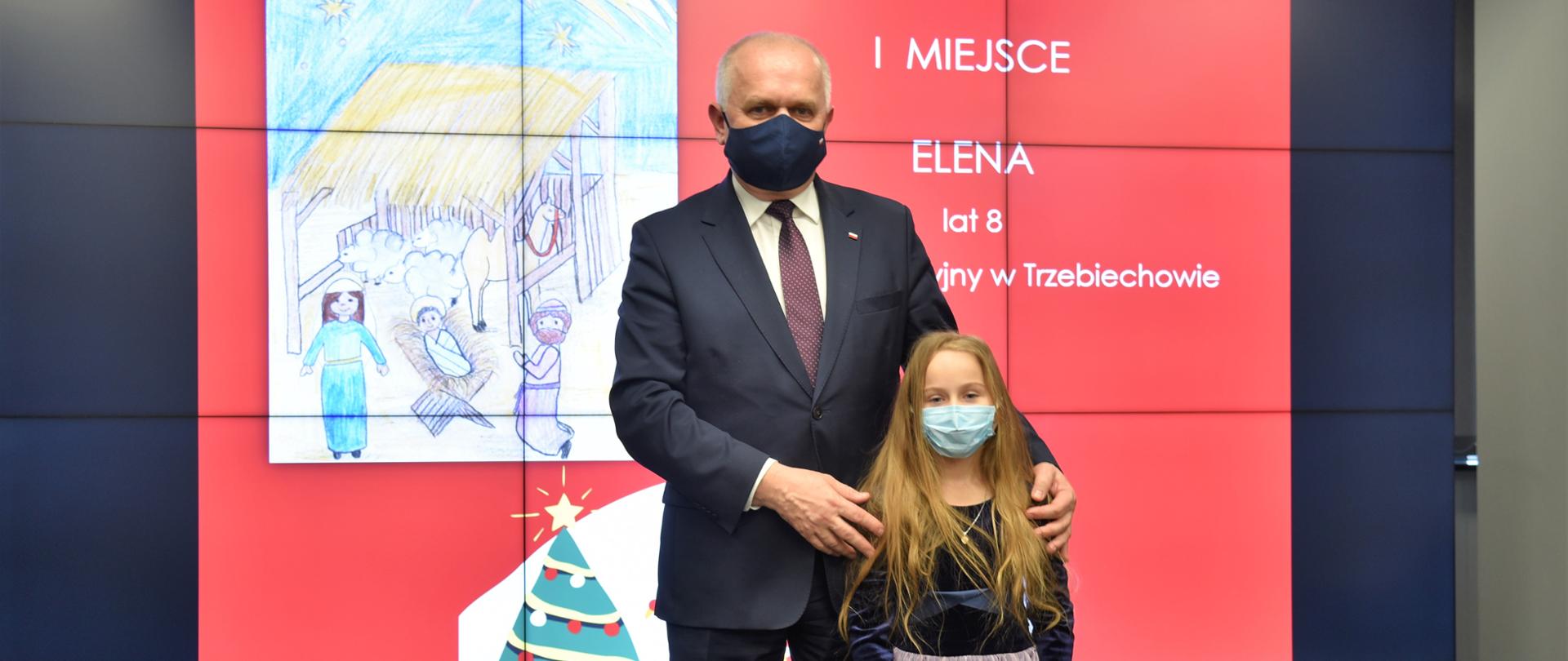 Wspólne zdjęcie Wojewody z autorką wygranej kartki - Eleną 