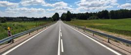 Rozbudowany odcinek DK65 między Oleckiem a Gąskami z nową nawierzchnią i barierami ochronnymi.