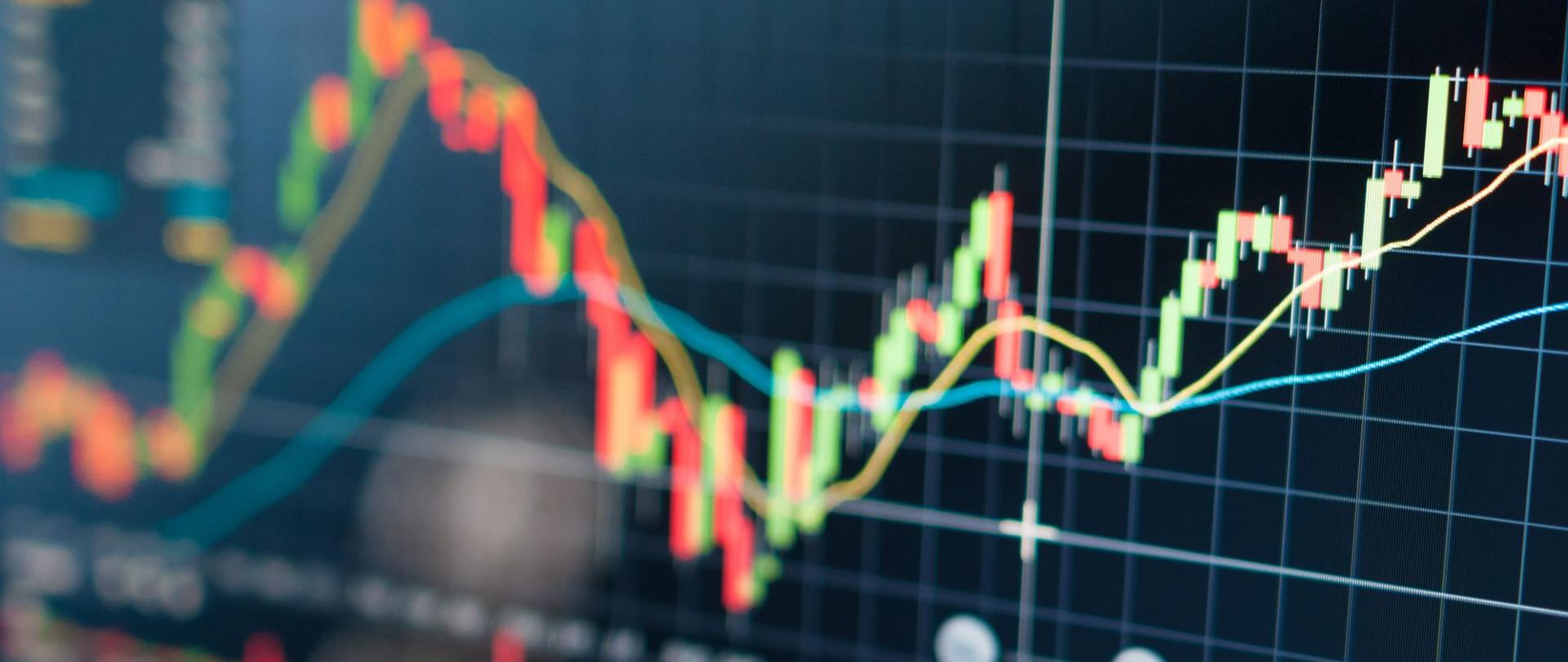 Wykres na granatowym tle.