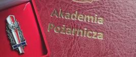 absolwentka A.Poż. oraz teczka dyplomowa