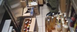 Kontrola celno-skarbowa baru. Na zapleczu nielegalny alkohol.