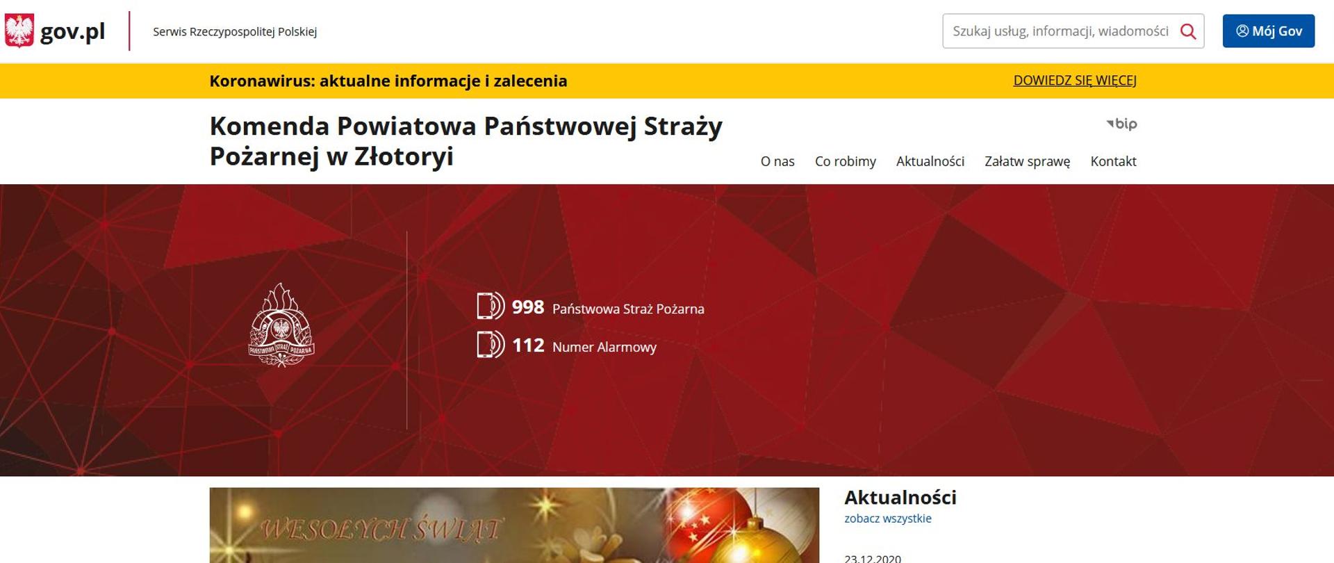 widok strony internetowej komendy powiatowej PSP w Złotoryi, czerwone tło z numerami alarmowymi w kolorze białym 998,112