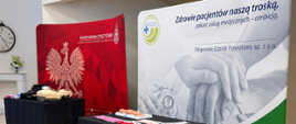 Zdjęcie przedstawia dwa bannery uczestników akcji "Bezpieczna MAMA", PSP Głogów i Głogowski szpital powaitowy