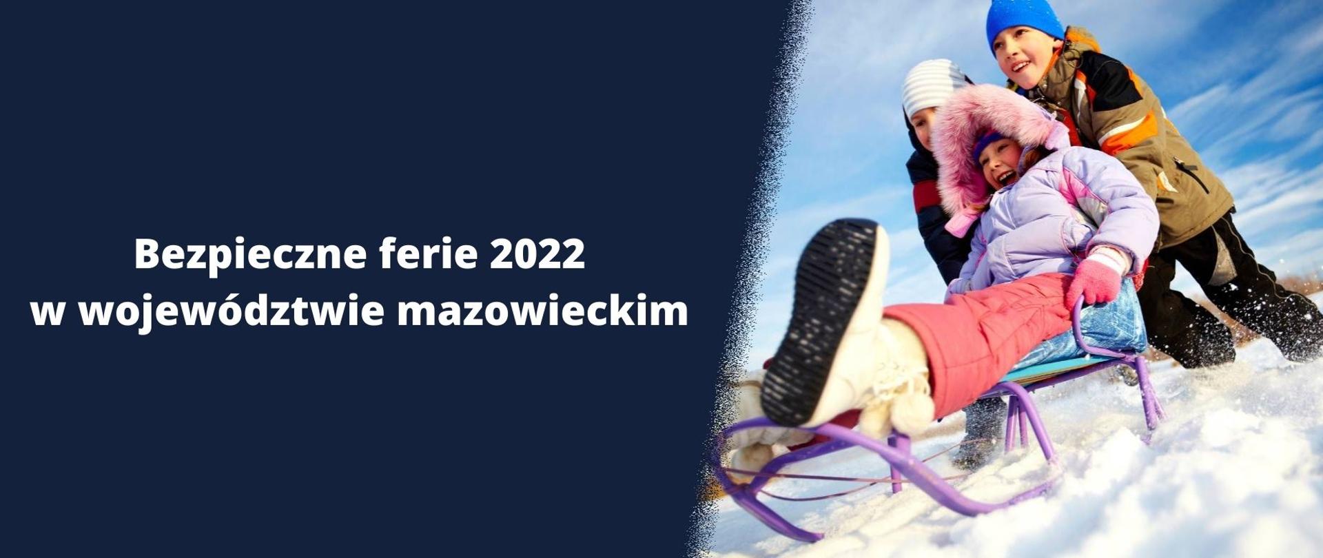 Na grafice, po prawej stronie znajduje się zdjęcie trojga dzieci, po lewej granatowe tło z białym napisem "Bezpieczne ferie 2022 w województwie mazowieckim."