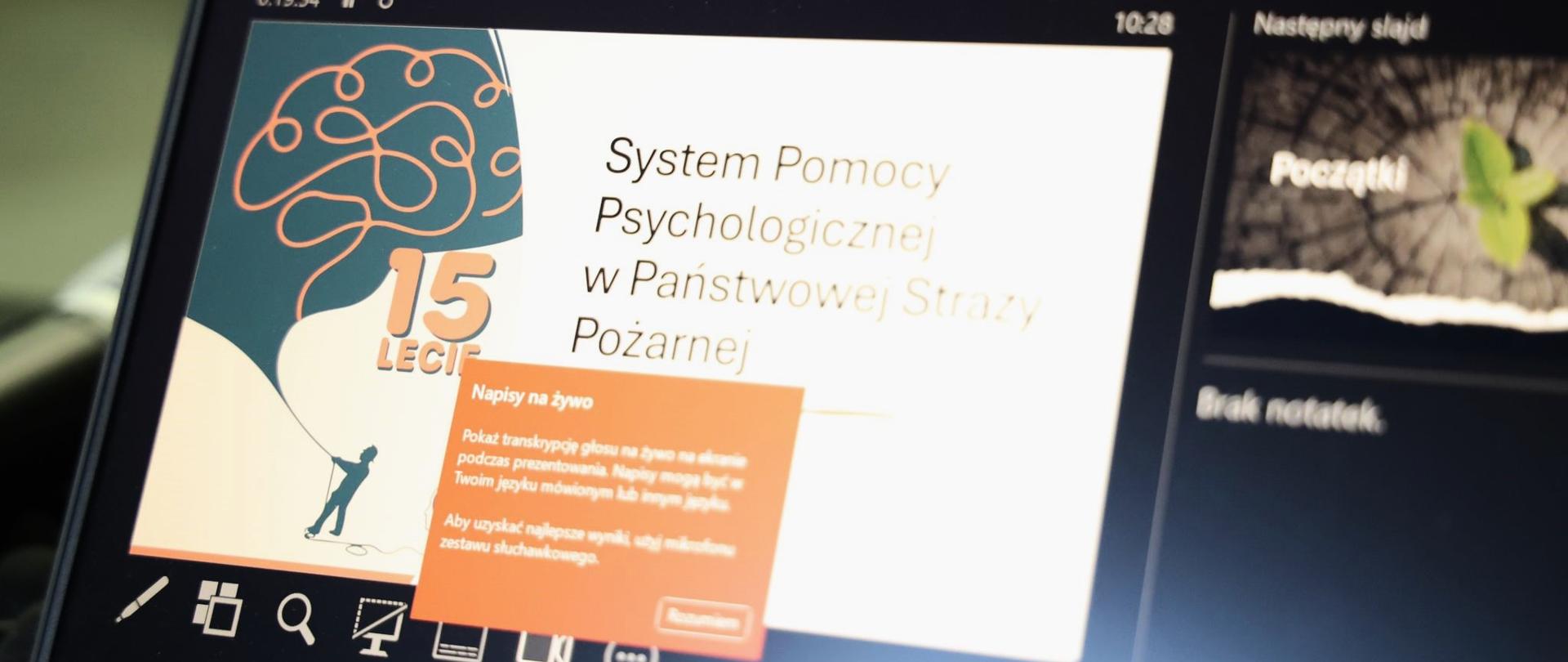 Widok na monitor komputera ze slajdem - System Pomocy Psychologicznej