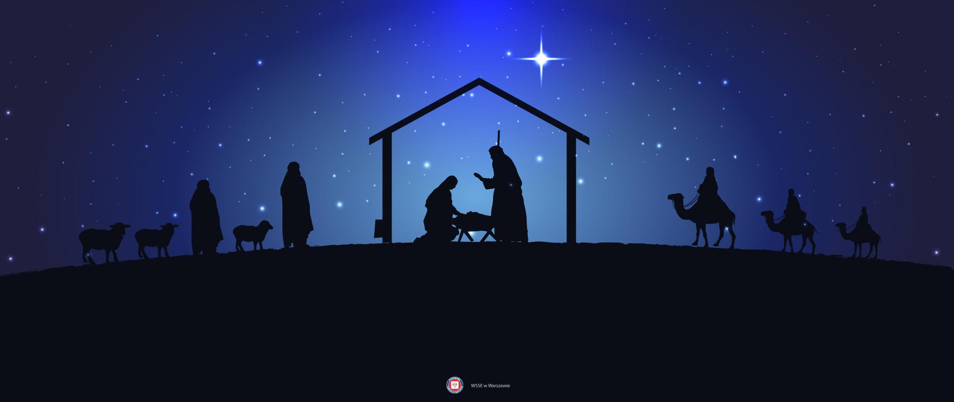 Grafika przedstawiająca szopkę, w której znajduje się Maryja z Józefem przy żłóbku. Obok po prawej do szopki zmierzają trzej królowie na wielbłądach. Po lewej pasterze z owcami. Nad szopką rozgwieżdżone niebo i duża gwiazda betlejemska.