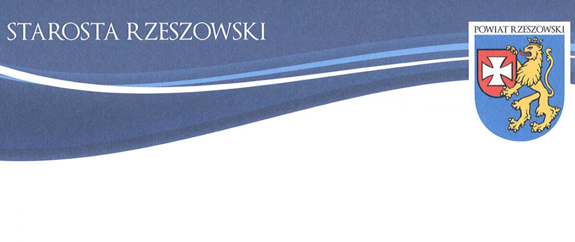 Zdjęcie przedstawia nagłówek listu gratulacyjnego starosty rzeszowskiego. W części lewej widnieje napis statosta rzeszowski, w części prawej znajduje się herb powiatu rzeszowskiego. Całość na biało-niebieskim tle rozdzielonym falistym wzorem.