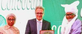 M. Klósak with Vice-Chancellor and Chancellor