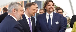 Prezydent A. Duda oraz minister J. K. Ardanowski podczas zwiedzania Miasteczka Regionów
