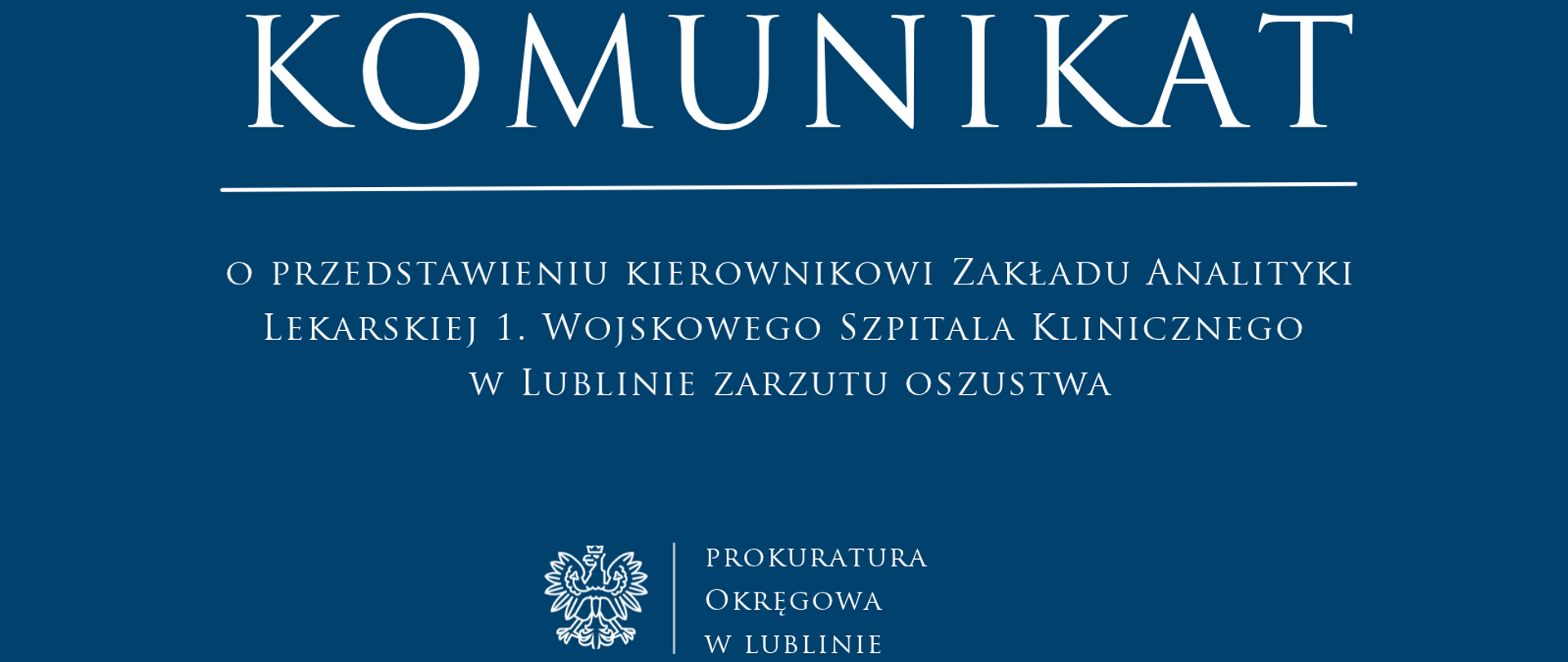 Niebieski baner o treści: Komunikat o przedstawieniu kierownikowi Zakładu Analityki Lekarskiej 1. Wojskowego Szpitala Klinicznego w Lublinie zarzutu oszustwa