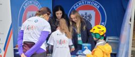 Stoisko edukacyjne organizowane przez Państwową Inspekcję Sanitarną w ramach mobilnych stref zdrowia 