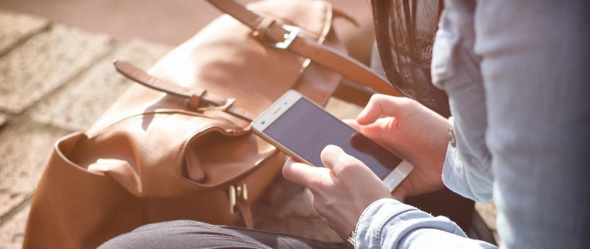 Young woman with smartphone
