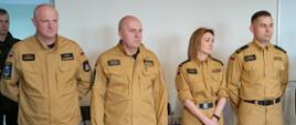 Na zdjęciu na świetlicy widzimy komisję OTWP w składzie od lewej: mł. kpt. Marcin Czarnecki, Komendant KP PSP w Rypinie st. bryg. Grzegorz Łydkowski, st. str. Justyna Pilśniak i sekc. Piotr Obarowski.