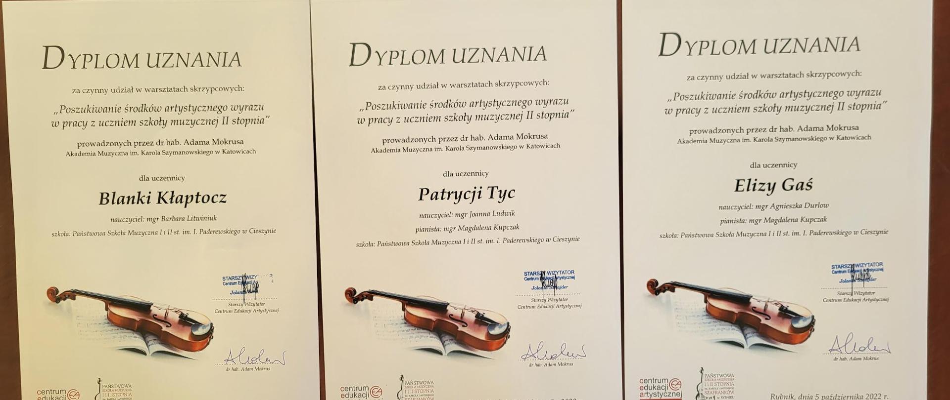 Zdjęcie przedstawia dyplomy uczestników warsztatów skrzypcowych